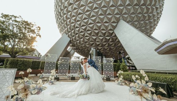 Disney’s Fairy Tale Weddings and Good Morning America celebrate the most popular wedding month of the year with an “Outta of This World Wedding” in front of Spaceship Earth at EPCOT.