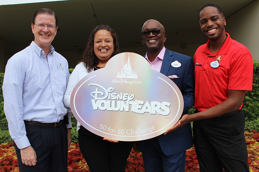 Disney VoluntEARS with nametag sign