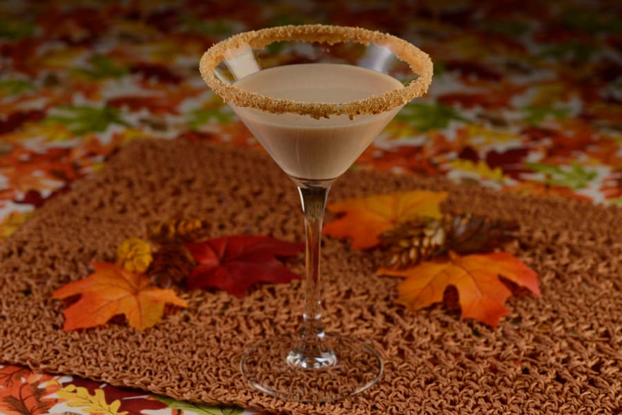 Photo of Pumpkin Spice Martini: Stoli Vanil Vodka, Rumchata, Cream, and pumpkin spice with a graham cracker crumb rim 