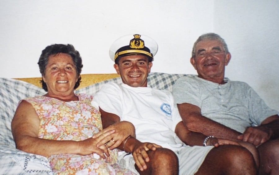 Michele with his mother and father, who is also a seafarer