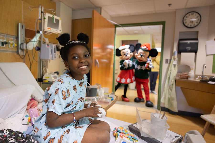 Mickey Mouse and Minnie Mouse visit patients in local hospital