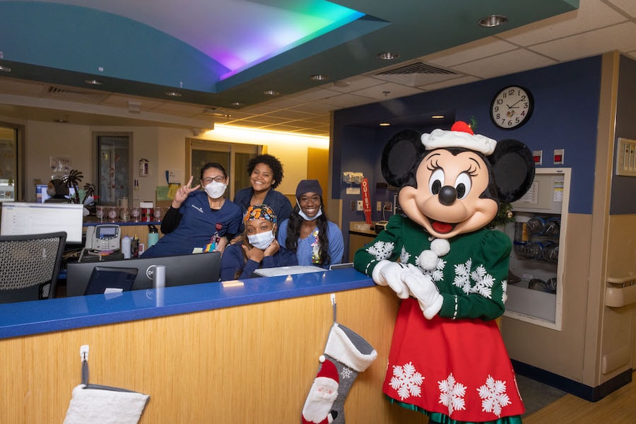 Minnie Mouse with healthcare staff