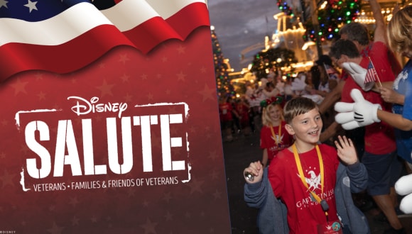 Disney SALUTE logo with guests and Disney VoluntEARS – along Main Street, U.S.A.