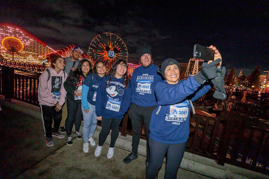 Cast members take a selfie during a Be Well Holiday 5K at Disneyland Resort