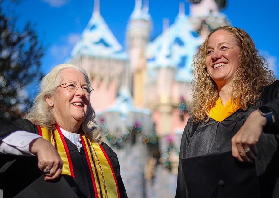 Disneyland Resort cast member and Disney Aspire graduate J'Amy with her advisor from the University of Denver