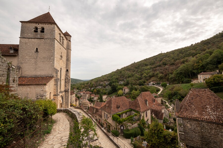 Landscape scene in Saint-Cirq Lapopie Village including beautiful buildings and mountains