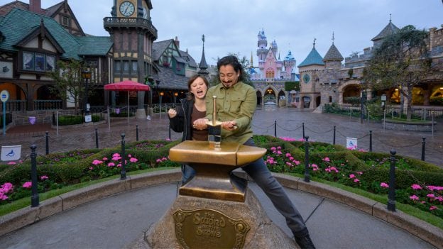 Ruby Cruz and Tony Revolori, stars from the all-new live-action fantasy adventure series on Disney+, “Willow,” trying to pull the sword out of the stone