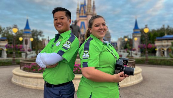 PhotoPass Photographers in new costumes holding cameras at Magic Kingdom