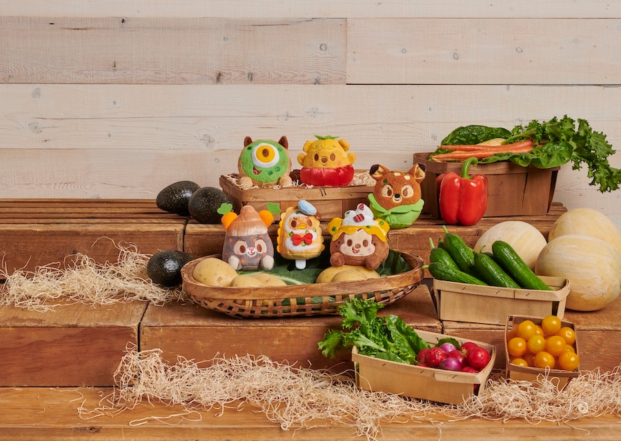 Disney Munchlings Garden Goodness collection contains a Loaded Baked Potato Mickey Mouse, Corn Elote Donald Duck, Stuffed Pepper Winnie the Pooh, Lettuce Wrap Bambi, Avocado Breakfast Bagel Mike, and a Spiced Carrot Cake Thumper. 