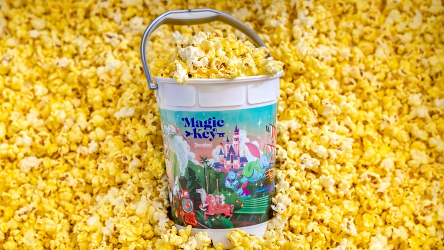 Disney 100 Magic Key Refillable Popcorn Bucket featuring Walt and a variety of Disney characters at Disneyland