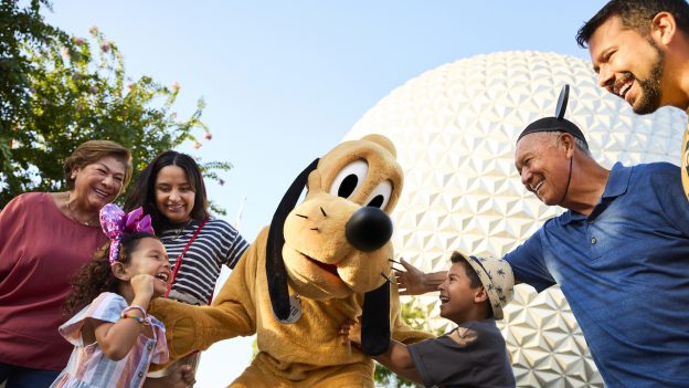 Family with Pluto at EPCOT