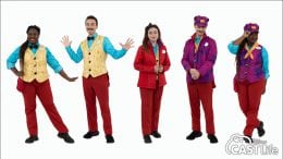 Cast members model the reversible Mickey & Minnie's Runaway Railway costumes