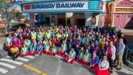 Mickey's Toontown cast members gather at the entrance to Mickey & Minnie's Runaway Railway