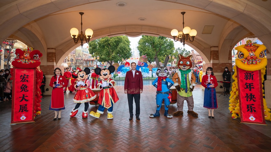 Joe Schott with Disney characters at Shanghai Disney Resort