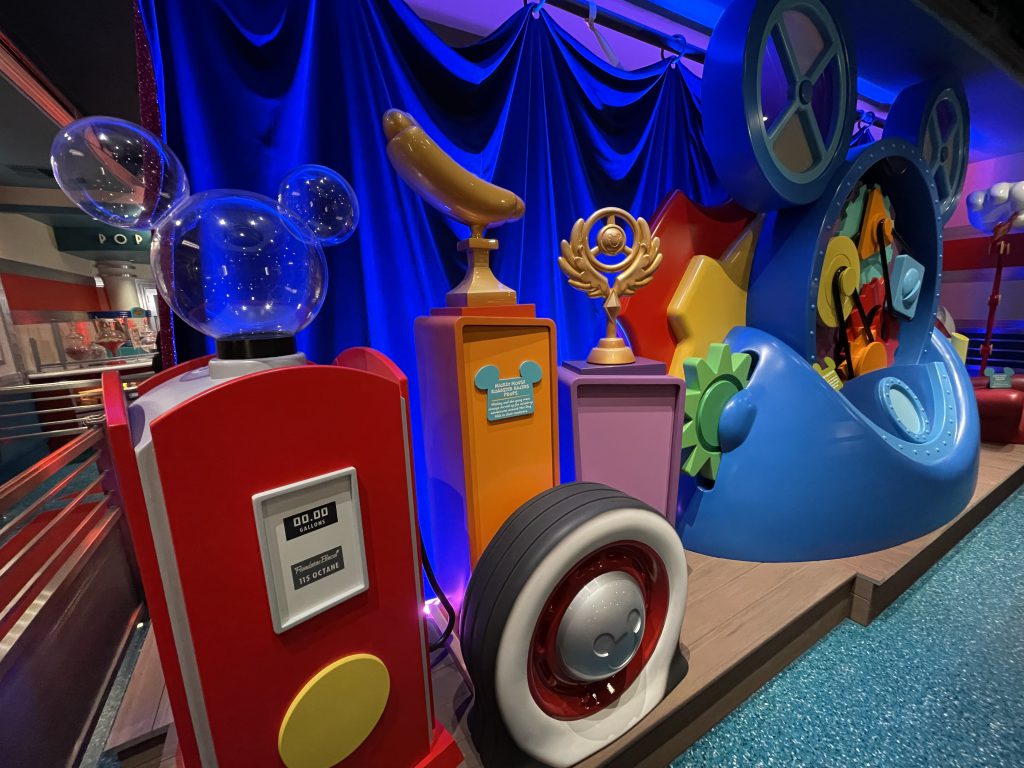 Mickey Mouse Roadster Racers cartoon props located inside the queue for Mickey and Minnie's Runaway Railway at Disneyland Park located within Mickey's Toontown.