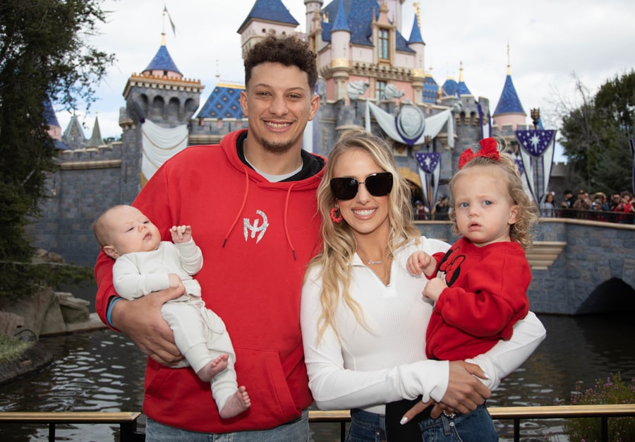 Patrick Mahomes, his wife Brittany, daughter Sterling Skye and son Patrick “Bronze” Lavon Mahomes III, posed for a photo in front of Sleeping Beauty Castle at Disneyland park. 