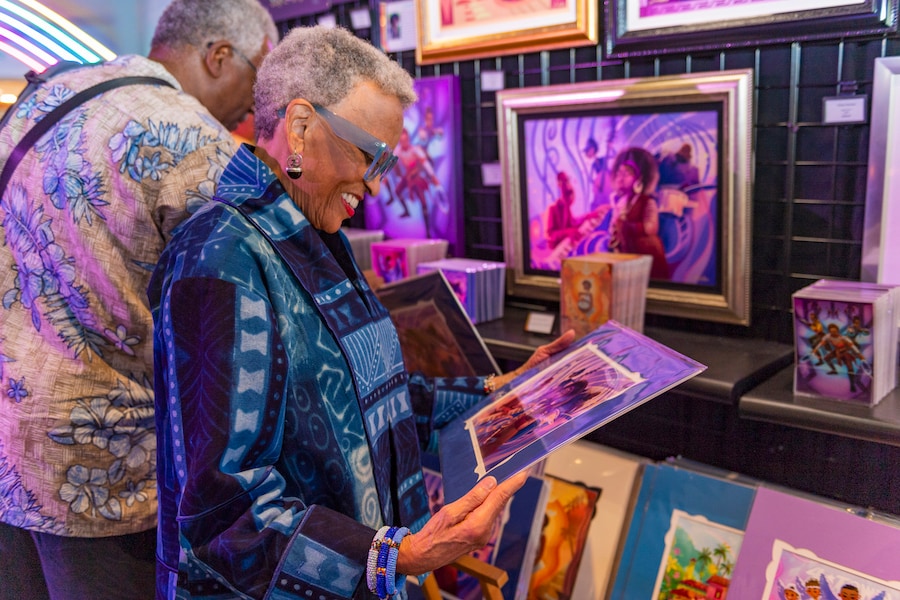 Dr. Johnnetta Cole with some artwork inspired by Disney and Pixar's "Soul" at Walt Disney World Resort