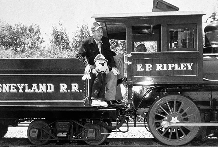 Walt Disney riding aboard the E.P. Ripley with Mickey Mouse