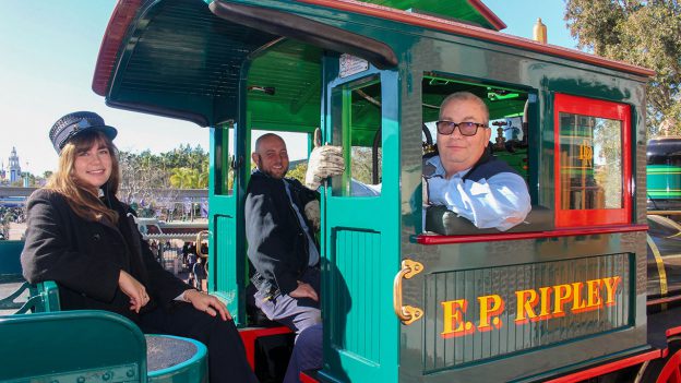Cast members sit in the cab of the E.P. Ripley engine