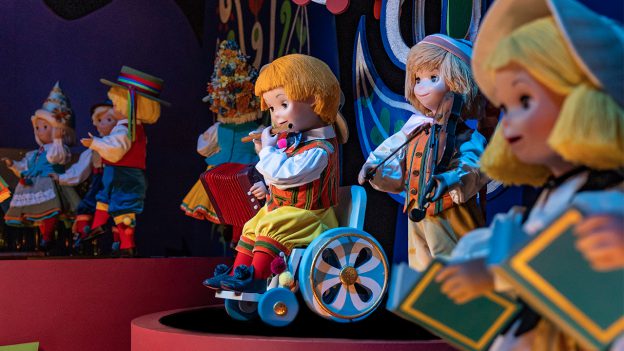 "it's a small world" doll in wheelchair