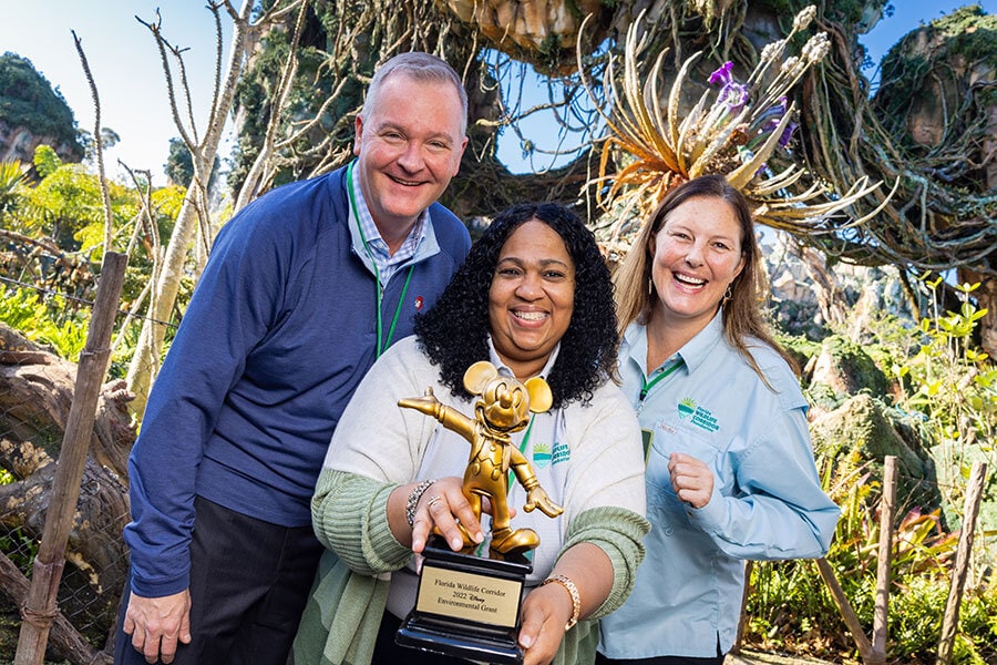 Disney Grant Recipients Pose with Special Mouse-Car