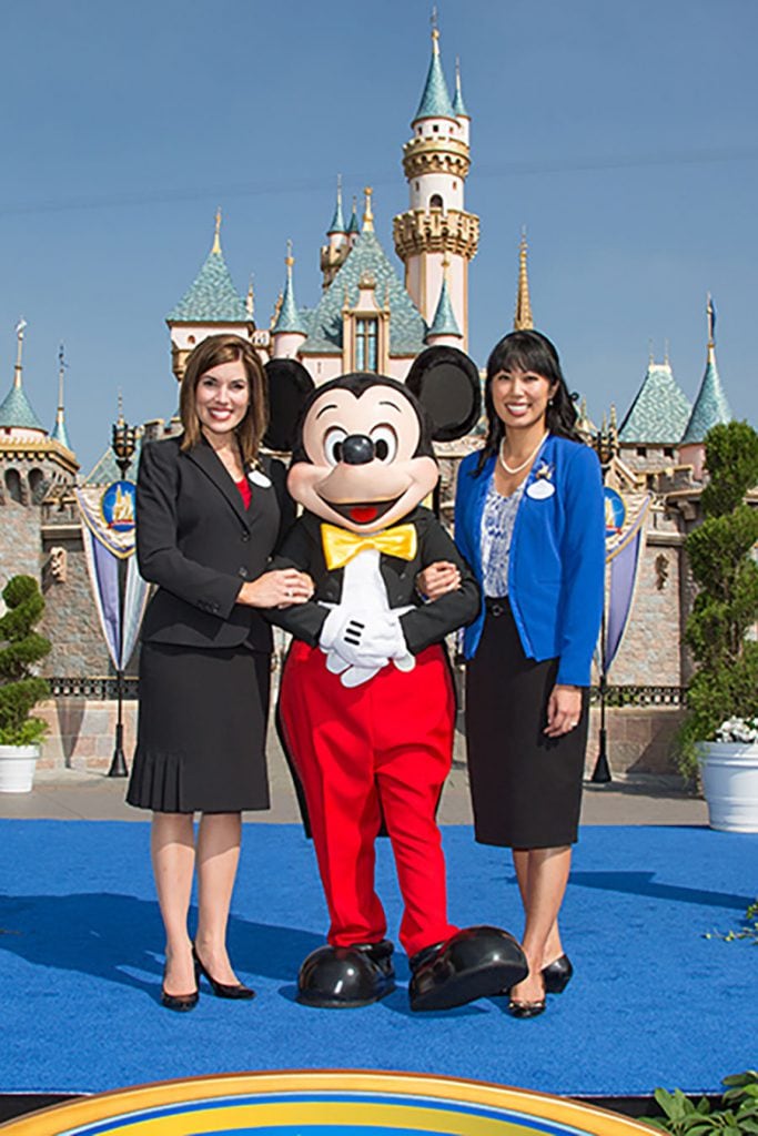 Jessica, Mickey Mouse and Allie in front of Sleeping Beauty Castle