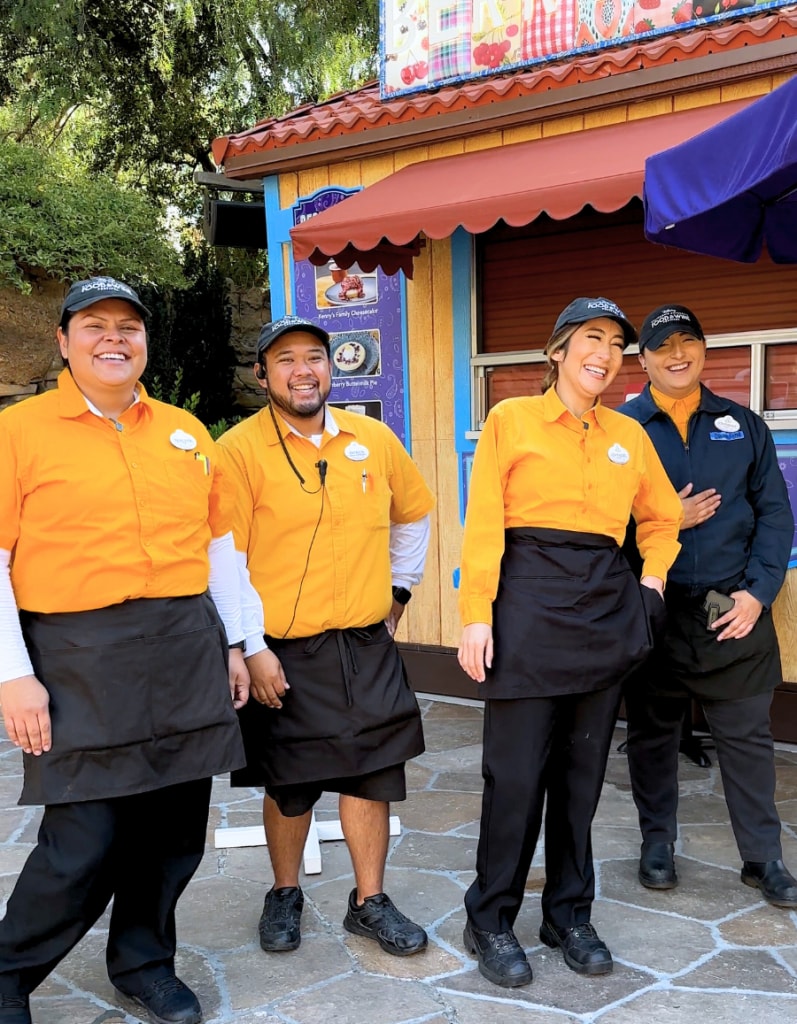 A group of Food & Beverage cast members smiling