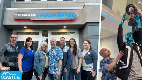 Visual merchandising cast members smile outside Tomorrowland Launch Depot.
