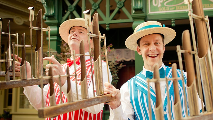 The Dapper Dans wear their classic striped suits as they play the Deagan Organ Chimes.