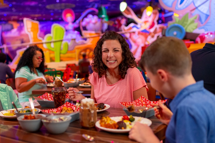 Guests at Disney’s Hollywood Studios in Toy Story Land at Roundup Rodeo BBQ