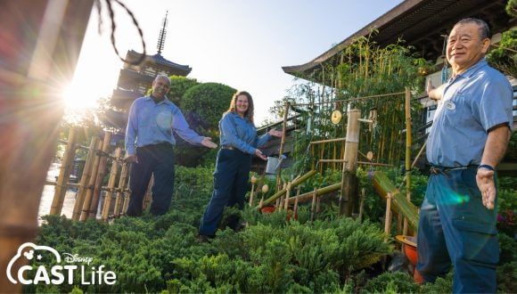 Shoji works with cast members in the shishi-odoshio in EPCOT.