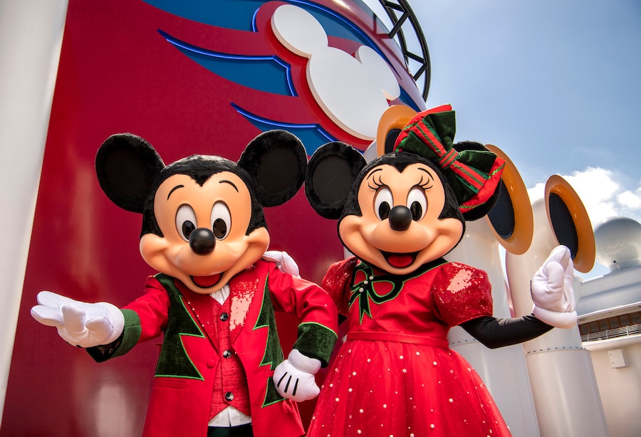 Mickey and Minnie Mouse in holiday outfits