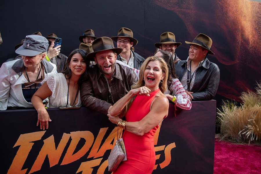 Disney Cast Member and Indiana Jones Epic Stunt Spectacular Marion performer meeting fans on the red carpet premiere