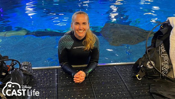 Noel smiles from the water in the main environment at The Seas with Nemo & Friends.