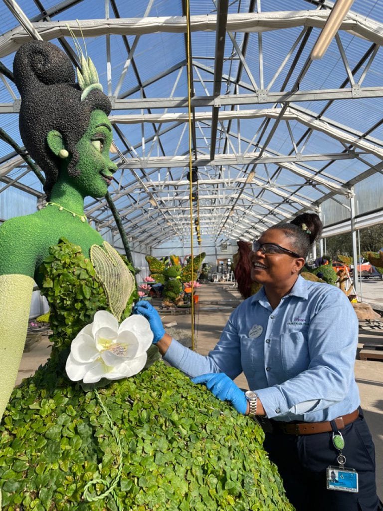 Antoinette in the greenhouse with Tiana topiary