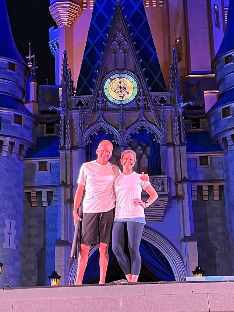 Yoga instructors in front of Cinderella Castle, Walt Disney World
