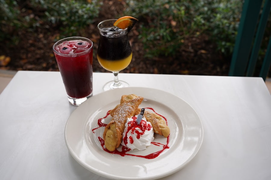 Pumpkin Blooderscotch Cannoli: Cannoli shells filled with pumpkin and butterscotch chip cannoli cream served with whipped cream, a red caramel “blood” drizzle, and a sugar knife (New), Naples Ristorante e Bar in Downtown Disney District (Available Sept. 1 through Oct. 31)