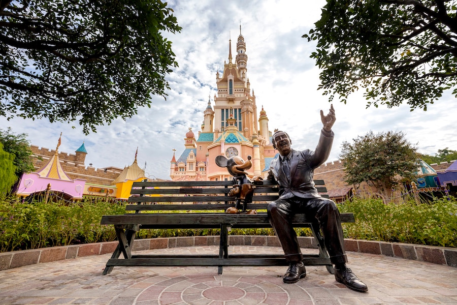 Dream Makers, a bronze statue of Walt Disney sitting on a park bench with Mickey Mouse at Hong Kong Disneyland