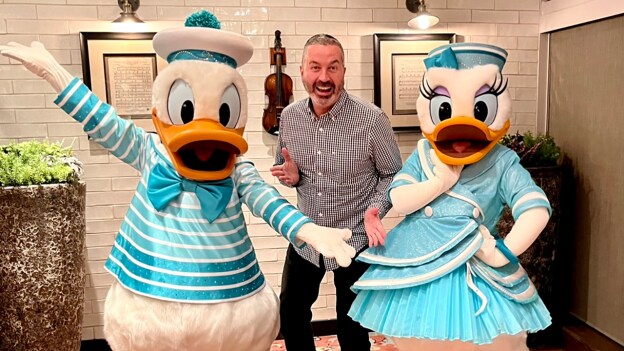 Cruise Director with Donald and Daisy