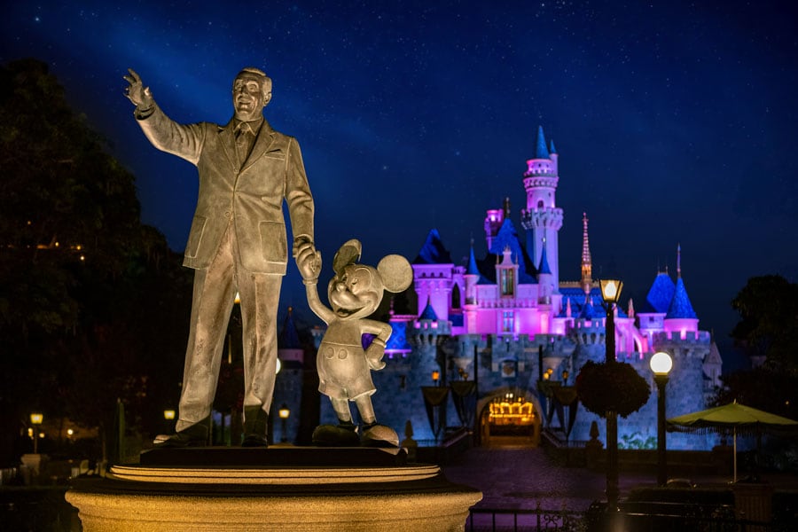 Walt Disney and Mickey Mouse Statue in front of the castle