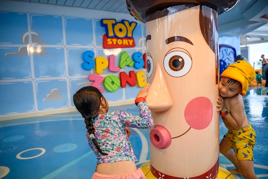Kids playing in the Toy Story Splash Zone on a Disney Cruise ship