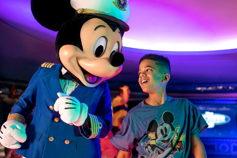Teen with Mickey on a Disney Cruise