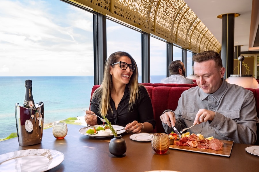 Adults enjoying an adult-only meal on a Disney cruise ship