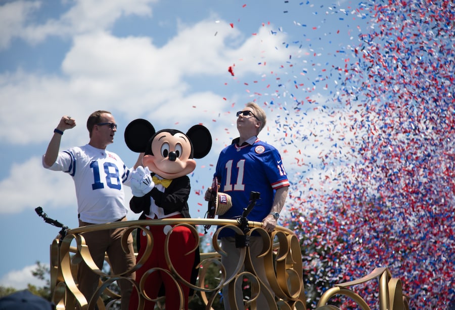 Peyton Manning and Phil Simms with Mickey Mouse at Walt Disney World, Magic Kingdom Park Hosts Special ESPN+ Peyton’s Places Look at ‘What’s Next?’ History