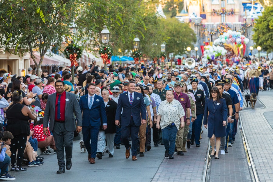 Members of Disney SALUTE Veteran Affinty Group march down Main Street U.S.A. as part of the Disneyland Veterans Day celebration.