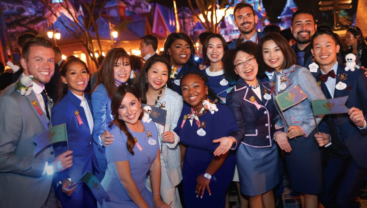 The Disney Ambassadors pose together in Arendelle as they celebrate the grand opening of World of Frozen