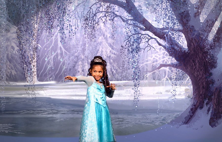 A child dressed as Elsa posing in the Frozen PhotoPass Studio photo ops in EPCOT 