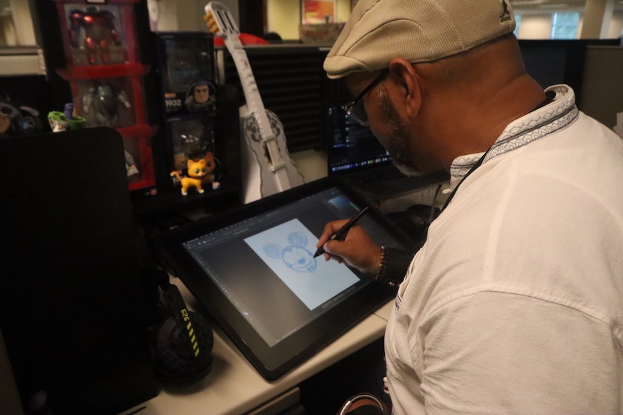 Designer sketches Mickey on digital pad