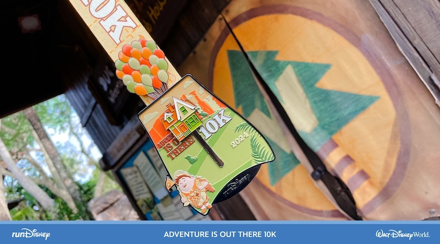 Adventure is Out There 10k finisher medal for the 2024 runDisney Springtime Surprise Weekend