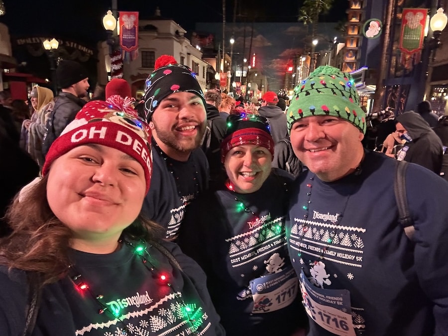Cast member Hannah with her friends and family during the 2022 Be Well...Cast Member, Friends & Family Holiday 5K at the Disneyland Resort